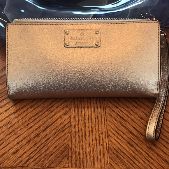 kate spade Handbags - Kate spare rose gold wallet